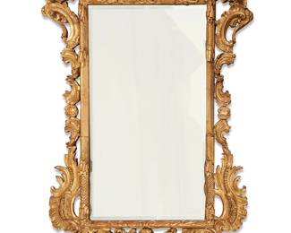 138
A Baroque-style giltwood mirror
19th century
The mirror set in a rectangular frame profusely decorated with carved acanthus leaves and an eagle within an architectural element at bottom
67" H x 37.75" W x 4" D
Estimate: $600 - $800