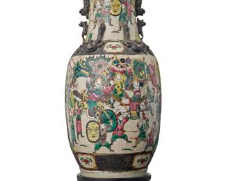 87
A Chinese Famille Rose porcelain vase
Late 19th/early 20th century
Bearing an apocryphal reign mark for Kangxi Period (1662-1722)
The vase depicting a battle scene, with dragon figures in relief to shoulder and neck, set on a carved wood stand
Porcelain: 17.5" H x 8.25" Dia.; Stand: 2.875" H x 7" W x 7" D
Estimate: $600 - $800