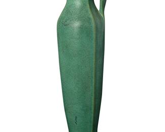 48
A Teco pottery Etruscan-style pitcher
Early 20th century
Designed by Fritz Albert (1865-1940)
Twice impressed: Teco; further impressed: 314
The handled pitcher with a matte green glaze
12.25" H x 3.5" Dia.
Estimate: $800 - $1,200