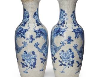79
A pair of Chinese blue and white porcelain vases
Late Qing Dynasty (1644-1912)
Each bearing a blue underglaze reign mark for Daoguang Period (1821-1850)
Depicting dragons and floral motifs
2 pieces
Each: 23.75" H x 9.75" Dia.
Estimate: $500 - $700