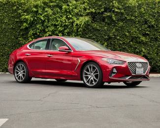 192
A 2019 Genesis G70
VIN: KMTG44LA6KU019566; Plate: 8RXG355
Red exterior with cream interior
11,9XX miles
2.0 liter, turbocharged V4 engine
8-speed automatic transmission, rear wheel drive
Radio, Apple Carplay, MP3 jack, and navigation
Sunroof
Genesis manuals included
Estimate: $15,000 - $20,000