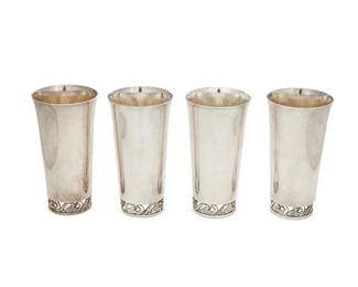 378
A set of eleven International sterling silver mint juleps
Mid-20th century
Designed by Alphonse La Paglia (1907-1953)
Each marked to underside: International Sterling / La Paglia Designed / 145
Each with a pierced floral base
11 pieces
Each: 5.75" H x 3" Dia.
Total weight: 70 oz. troy approximately
Estimate: $1,200 - $1,800