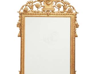29
A Louis XVI-style giltwood mirror
19th century
The later mirror set in a rectangular frame with foliate and tassel accents, crested by an architectural element with birds, a floral wreath, and scrolled foliate motifs
48.75" H x 28.75" W x 4" D
Estimate: $400 - $600