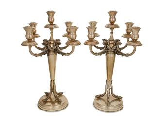 3
A pair of Dutch .900 silver five-light candelabra
20th century, Seton Brothers; Schoonhoven
Marked to underside: GS [in a cartouche] / 900
Each five-light candelabrum with dolphin-form arms and supports
2 pieces
Each: 8.5" H x 12.25" Dia.
Total weight: 128.5 oz. troy approximately
Estimate: $700 - $900