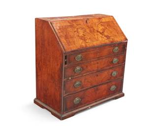 344
A Victorian slant-front desk
Late 19th century
Hinged marked: Hodges patent
The locking drop front revealing a fitted interior centering four small drawers to each side, above four larger locking drawers with brass pulls
36.5" H x 37.75" W x 19.5" D
Estimate: $500 - $700