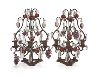 25
A pair of Louis XV-style brass and glass girandoles
20th century
The brass three-light girandoles set on tripartite stands, mounted with cut glass grape, apple, and other fruit-form drop pendants
2 pieces
Each: 17" H x 12" W x 10" D
Estimate: $300 - $500