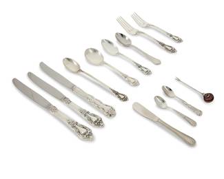 381
A Lunt sterling silver 'Eloquence' flatware service
Late 20th century
Each marked: Lunt / Sterling / Eloquence
Designed 1953, comprising 17 dinner forks (7.375"), 18 salad forks (6.5"), 13 cream soup spoons (6.25"), 17 teaspoons (6.125"), 1 iced tea spoon (7.375"), 16 dinner knives (9.125"), and 1 place knife (9.875"), together with the following stainless: 7 associated butter spreaders, 1 place knife, 3 spoons, and an oyster pick
83 pieces
Total weighable sterling: 102.4 oz. troy approximately
Estimate: $2,000 - $4,000