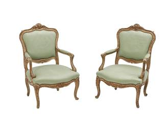 146
A pair of Italian Rococo giltwood open armchairs
18th/19th century
Each chair with carved scroll, acanthus, and shell accents, upholstered in an updated green fabric with brass tacking, together with two associated throw pillows
2 pieces
Each: 38.75" H x 26" W x 26" D
Estimate: $600 - $800