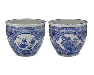 81
A pair of Chinese blue and white porcelain jardinières
20th century
Each decorated in friezes depicting children, with floral motif ground, set on a wood stand
2 pieces
Each porcelain: 13.375" H x 15.875" Dia.; Each stand: 8.25" H x 13.75" Dia.
Estimate: $400 - $600