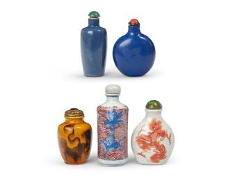 162
Five Chinese porcelain snuff bottles
19th/20th century
One bearing an apocryphal reign mark for Chenghua Period (1465-1487); the other with indecipherable reign mark
Comprising two depicting guardian lions, one depicting mythical sea creatures, and two solid blue
5 pieces
Tallest: 3.625" H
Estimate: $500 - $700