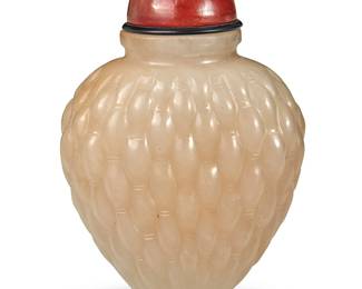 169
A Chinese carved calcite snuff bottle
19th/20th century
Carved with a basketweave pattern
2.5" H x 1.875" W x 1.25" D
Estimate: $300 - $500