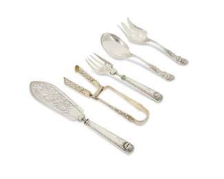 390
A group of sterling silver serving utensils
Late 19th/20th century
Each marked for sterling; fish servers marked for Sheffield and London, dated 1870, and maker: R MEH [Martin Hall & Co.]; asparagus marked for London, dated 1878, Elizabeth III, and maker: HJL [Henry John Lias]; salad set marked for Reed & Barton
Comprising an Elizabethan fish server set (larger 12.625"), an Elizabethan asparagus tongs (9.375"), and a Reed & Barton 'Francis I' salad serving set (each: 9.5"), personalized
5 pieces
Total weighable sterling: 16.1 oz. troy approximately
Estimate: $500 - $700