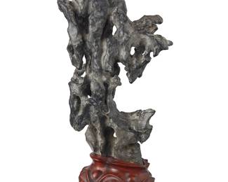 191
A Chinese Ling Bi scholar stone
20th century
Mounted on a carved hardwood stand
Stone: 13.75" H x 7.5" W x 4" D; Overall: 16.75" H
Estimate: $2,000 - $3,000