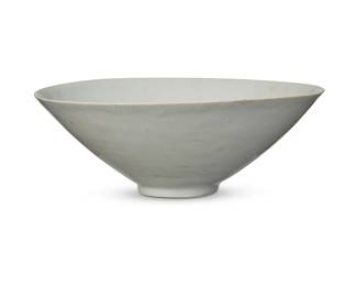 63
A Chinese Qingbai white porcelain bowl
Song/Yuan Dynasty (960-1368) or later
The footed bowl with incised motifs to interior, set on a hardwood base, housed in a custom formed fabric-clad and velvet-lined box
Bowl: 2.75" H x 7.625" Dia. (irregular); Box: 4.75" H x 10" W x 10" D
Estimate: $600 - $900
