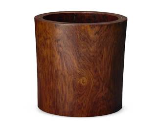 201
A Chinese hardwood brush pot
Qing Dynasty (1644-1912) or later
Possibly Huanghuali wood
6.75" H x 6.75" Dia.
Estimate: $1,200 - $1,800
