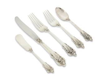 388
A Wallace sterling silver 'Grand Baroque' flatware service
Mid/late 20th century
Each marked for Wallace and for sterling
Designed 1941, comprising 12 dinner knives (9"), 8 butter spreaders (6.375"), 12 dinner forks (7.625"), 12 salad forks (6.375"), and 12 teaspoons (6.25")
56 pieces
Total weighable sterling: 64.6 oz. troy approximately
Estimate: $1,800 - $2,500