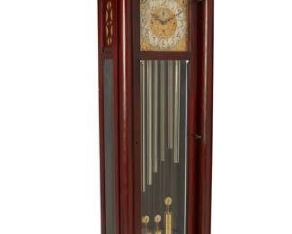 403
A Classical Revival mahogany nine-tube long case clock
20th century, retailed by Marshall, Field & Co.
Dial marked: Chicago / Marshall Field & Co.; movement marked: Germany; subsidiary dials marked: Chime / Silent / Westminster / Whittington
The three-movement clock with nine tube chimes and a silvered and gold-toned metal dial bearing Arabic hour markers, including seconds sub-dial with Arabic track and a moon phase dial, housed in a glazed wood case with opposed columns
92.5" H x 28.75" W x 18" D
Estimate: $600 - $900