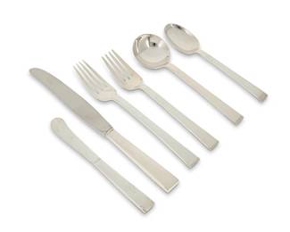 379
An International sterling silver 'Continental' flatware service
Late 20th century
Each marked for International Sterling
Comprising 12 dinner knives (8.875"), 12 butter spreaders (6"), 12 dinner forks (7.375"), 11 salad forks (6.75"), 12 cream soup spoons (6.375"), and 12 teaspoons (6.125")
73 pieces
Total weighable sterling: 71.7 oz. troy approximately
Estimate: $1,000 - $1,500