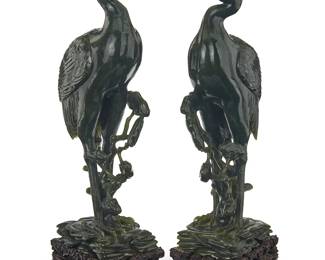 178
A pair of Chinese carved nephrite and carnelian figures of cranes
Qing Dynasty (1644-1912) or later
Each set in a carved hardwood stand
2 pieces
Each figure: 14" H x 5.5" W x 3.5" D; Each overall: 15.75" H x 6" W x 4" D
Estimate: $5,000 - $8,000