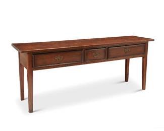 354
A George III mahogany server
19th century
The apron fitted with three drawers, with brass pulls
28.5" H x 72" W x 18" D
Estimate: $400 - $600