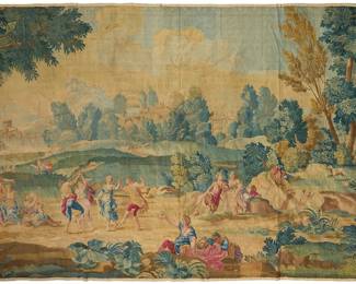 139
A Flemish Baroque tapestry
18th century
Depicting a pastoral celebration scene with people dancing and feasting within a country landscape with trees and grand buildings in the distance, woven in polychrome wool and silk threads
8' 0.5" H x 11' 8" W
Estimate: $1,200 - $1,500