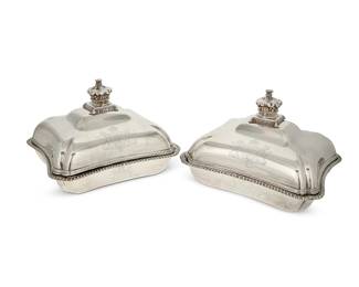 308
A pair of English sterling silver entrée dishes
1827-1845
Each marked for sterling, London, and maker Robert Garrard II; lower components with George IV mark and dated: 1827; covers with Queen Victoria mark and dated: 1845
Each lid with a crown finial, one with an inner partition, with armorial showing the royal coat of arms and personalized
2 pieces
Each: 7.75" H x 10.625" W x 9.375" D
Total weight: 123.2 oz. troy approximately
Estimate: $2,500 - $3,500