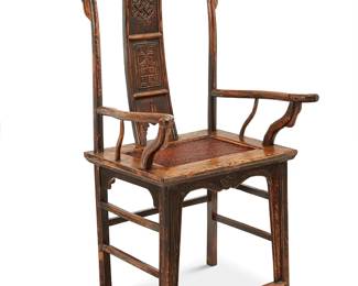 227
A Chinese carved wood 'official's hat' armchair
20th century
The chair with yolk back crest rail above a curved splat carved with medallions, above a seat with inset caning and fabric-upholstered cushion
45" H x 25.5" W x 22.5" D
Estimate: $500 - $700