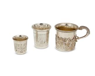 7
Three Russian silver cups
1832-1858
Each marked for 84 zolotnik and variously dated; two marked for assay master Nikolay Dubrovin; each with undeciphered maker's mark
Comprising one handled cup with applied dancing figures, and two with chased designs, one of a town and one of floral motifs
3 pieces
Largest: 3.25" H x 4.25" W x 2.875" D; Smallest: 1.875" H x 1.875" Dia.
Total weight: 7.3 oz. troy approximately
Estimate: $1,000 - $1,500