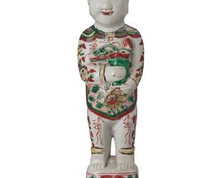 64
A Chinese polychrome porcelain figure of a boy
17th century or later
Possibly Transitional, the figure decorated with floral motifs throughout, depicted holding a vase with flowers
11.25" H x 3.375" W x 3.125" D
Estimate: $500 - $700