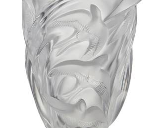 38
A Lalique glass 'Martinets Swallow' vase
Late 20th century
Etched: Lalique ® France [post-1978]
The molded frosted glass vase depicting swallows in high relief
9.625" H x 7" Dia.
Estimate: $500 - $700