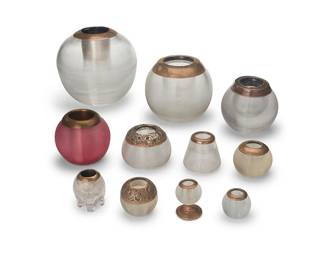 311
A group of sterling silver and glass match strikes
Late 19th/20th century
Most marked for sterling and most with British hallmarks for various makers
Each ribbed glass body mounted with a silver or silver-plated insert, some with repoussé decorations to rim, together with one copper alloy insert set in pink glass
11 pieces
Largest: 6.5" H x 7" Dia.; Smallest: 1.75" H x 1.875" Dia.
Estimate: $400 - $600