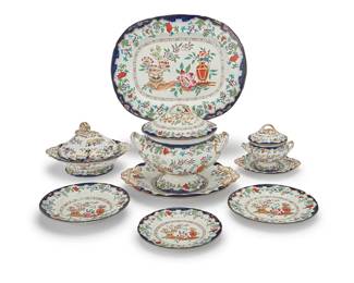 322
A Minton & Co. ironstone 'Poonah' dinner service
Circa 1841-73
Each stamped: POONAH [in a cartouche] / M & Co.; impressed: B . B / New Ironstone; marked in red: 6099
Comprising 31 dinner plates (10.25"), 11 salad plates (9"), 12 soup bowls (10.375"), 5 oval serving trays (largest: 19.25" W x 15.375" D), 1 round serving tray with handles (15.25" W x 13.5" D), 1 large soup tureen (10.75" H x 12.25" W x 10.5" D), 2 covered sauce tureens with underplate (overall: 6.625" H x 9" W x 8" D), and 3 covered servers (6.75" H x 11.75" W x 11" D)
66 pieces
Estimate: $600 - $800