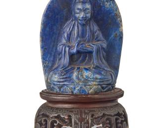 175
A diminutive Chinese carved lapis figure of Guanyin
Late Qing Dynasty (1644-1912) or later
Set on a carved and metal-inlaid hardwood stand
Stone: 2.25" H x 1.625" W x 1" D; Stand: 1" H x 1.875" W x 1.5" D
Estimate: $800 - $1,200