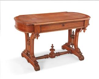 350
A Victorian mahogany center table
Late 19th century
With inset leather top above a single locking drawer to one side, raised on scrolled trestle supports joined by a turned and block stretcher, set on casters
Without casters: 27.5" H x 47.25" W x 25.5" D
Estimate: $400 - $600
