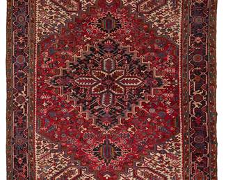 100
A Heriz rug
Mid-20th century
With tag verso: [script] / Made in Iran
Wool on cotton foundation
10' 4" L x 8' W
Estimate: $800 - $1,000