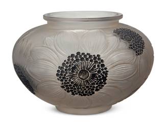 33
A René Lalique glass 'Dahlias' vase
1923-1937
Designed 1923 by René Lalique (1860-1945)
With sand-blasted stencil mark to underside: R. LALIQUE
The molded frosted glass footed vase with black enameling to flowers
5" H x 7.25" Dia.
Estimate: $800 - $1,200