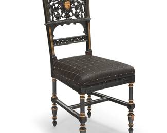 402
An American Renaissance Revival carved wood side chair
Circa 1870
The parcel gilt and ebonized wood chair with pierced seatback depicting a mask and foliate motifs, above a later fabric-upholstered seat, raised on turned legs joined by an H-stretcher
37.75" H x 16.5" W x 20" D
Estimate: $500 - $700