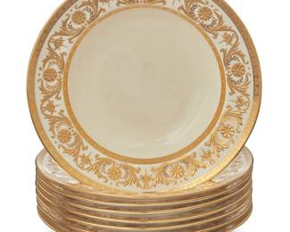 321
A set of eight Mintons gilt porcelain soup bowls
Early 20th century, retailed by Tiffany & Co.
Each marked with pattern in red enamel: H1832; factory and retailer marks in pink; New York / Made in England
With gilt foliate decoration to rim
8 pieces
Each: 1.5" H x 8" Dia.
Estimate: $400 - $600
