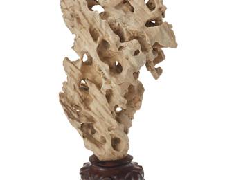 190
A Chinese Taihu scholar stone
20th century
Mounted on a carved hardwood stand
Stone: 22.5" H x 13" W x 19" D; Overall: 28" H
Estimate: $1,000 - $1,500