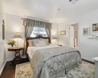 French Queen Headboard, frame, box springs and mattress
Brocade Queen comforter, shams, bedskirt, 4 throw pillows, and curtains
Matching lamps