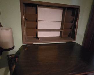 Small built-in-the-wall drop front desk