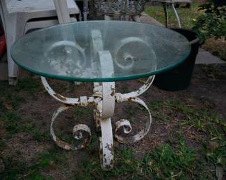 Glass top cast iron table