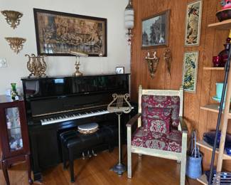 Samick piano with bench, framed kitty tapestry above piano, royal gold chair, and so much more!