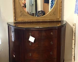 demi-lune chest and gold leaf mirror