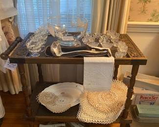 carved tea cart with midcentury punch bowl and antique crochet placemats