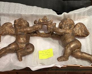 very old papier mache cherubs