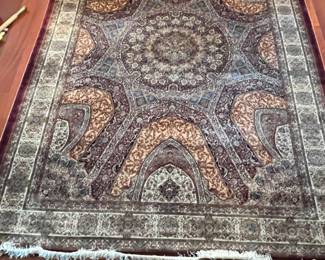 a very fine silk rug - pristine condition