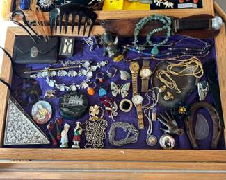 antique and vintage costume jewelry, hair ornaments, religious icons, etc.