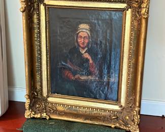 antique portrait in carved frame