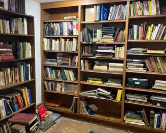 lots of books - some in Italian, lots of mathematical and nuclear academic books, gardening, art, classics, novels